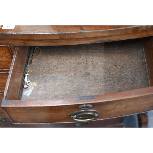 17 - A 19th century mahogany bowfront chest of two short over three long drawers raised on bracket feet, ... 