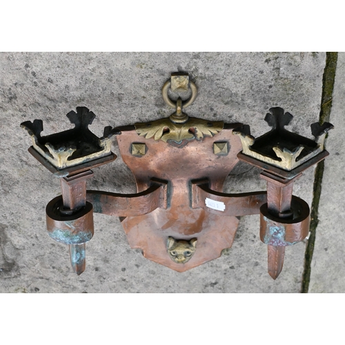 174 - A pair of Arts and Crafts copper and brass Gothic style twin branch sconces, 25 cm high