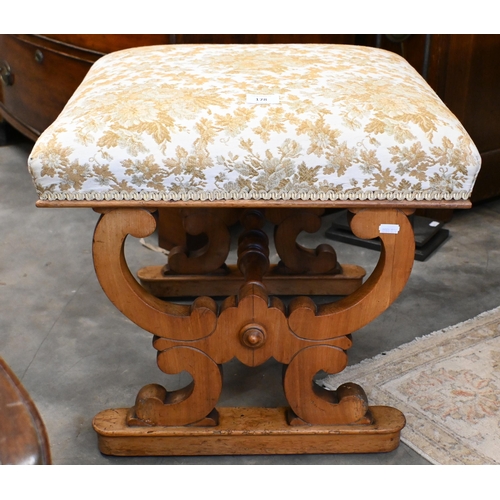 178 - A Continental walnut stool with floral upholstery