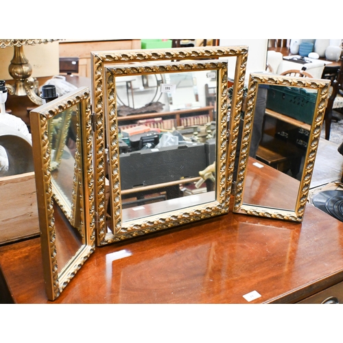 191 - A gilt framed triptych dressing table mirror, 86 cm w x 50 cm h