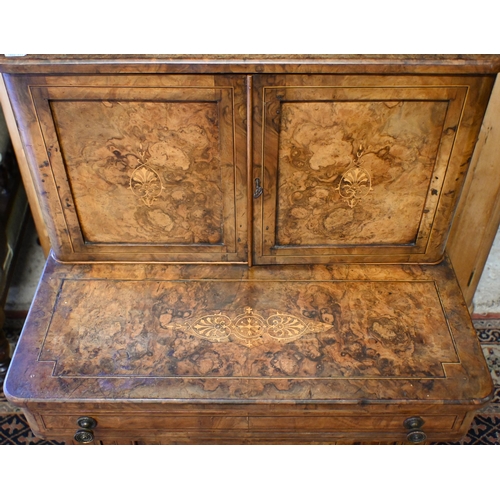 198 - A Victorian boxwood inlaid figured walnut combination desk and music cabinet, with small cabinet doo... 