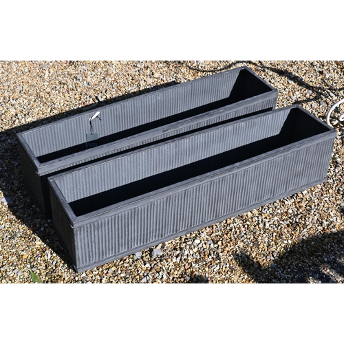 204 - A pair of new old-stock 'Garden Trading' galvanised finished tin planter troughs, 90 cm x 21 cm x 21... 