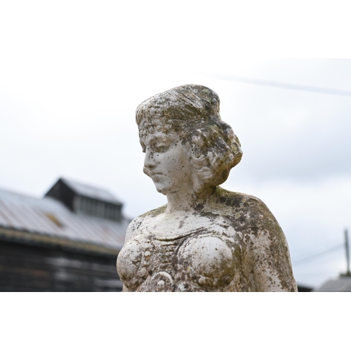 208 - A weathered 1920s style garden statue, female, 77 cm h