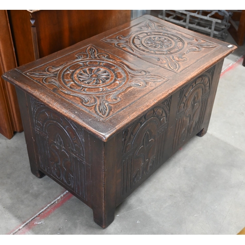 22 - A small carved oak coffer, 80 x 50 x 48 cm high