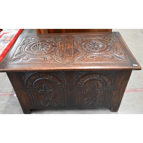 22 - A small carved oak coffer, 80 x 50 x 48 cm high