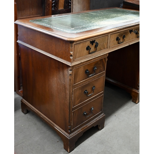 23 - A mahogany twin pedestal desk, a/f 122 cm wide x 62 cm deep x 78 cm high