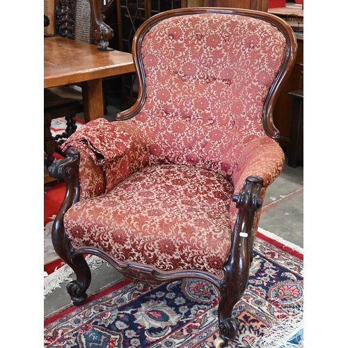 31 - Victorian mahogany spoon back armchair with floral upholstery