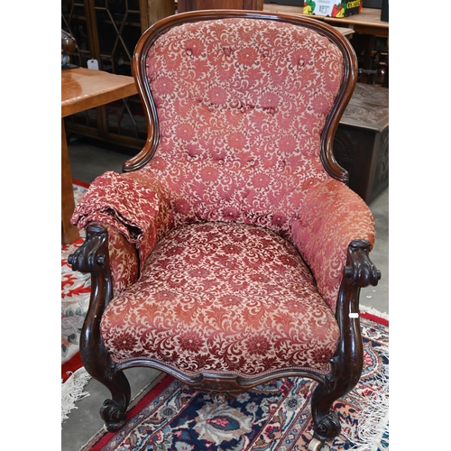 31 - Victorian mahogany spoon back armchair with floral upholstery