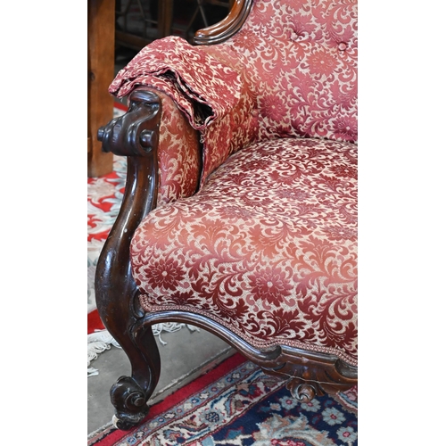 31 - Victorian mahogany spoon back armchair with floral upholstery