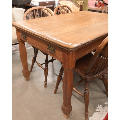 36 - An antique fruitwood kitching dining table with end drawer and shaped supports, 138 x 90 x 76 cm to/... 