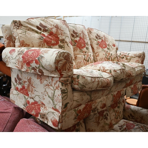 39 - # A pair of three seater scroll arm sofas in floral fabric, 190 cm wide x 80 x 80 cm high (2)