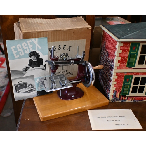 504 - A Mettoy tinplate model house with printed cardboard back and a selection of plastic furnishings 26 ... 