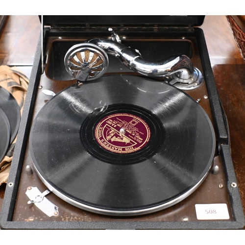 508 - An HMV portable wind-up gramophone c/w a selection of 78rpm records