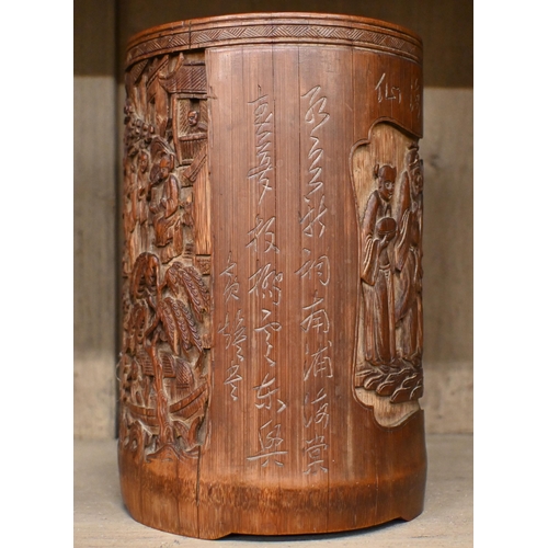 519 - A Cantonese carved bamboo bitong (brush-pot) with relief garden scene, figures and inscription, 18.5... 