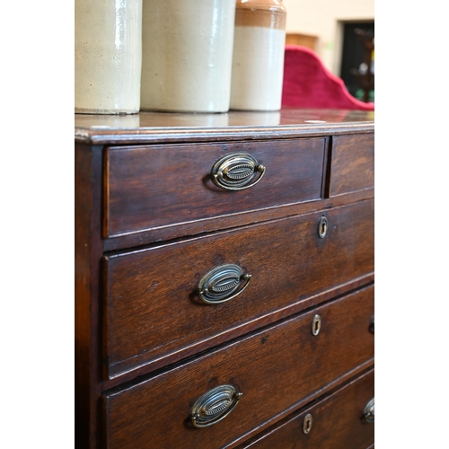 52 - A 19th century oak chest of two short over four long graduating drawers raised on shaped bracket fee... 