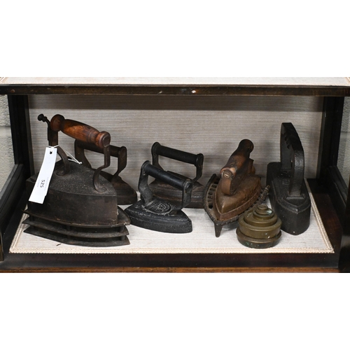 525 - A Falkirk 'hot brick' clothes-iron c/w iron insert, to/w a snooker-table iron, four flatirons, two i... 