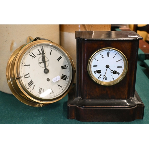 529 - A vintage brass-cased ship's bulkhead clock with 15cm dial to/w a French walnut and ebonised mantel ... 