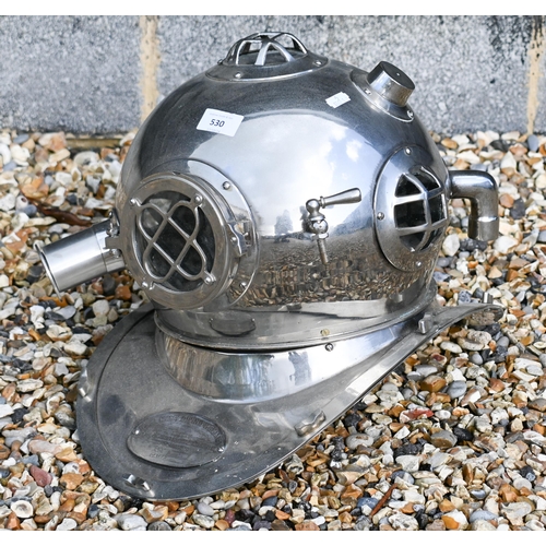 530 - An electroplated reproduction diver's helmet, 35 cm high