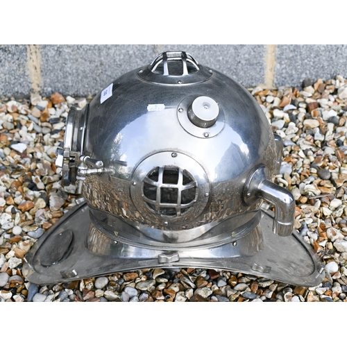 530 - An electroplated reproduction diver's helmet, 35 cm high