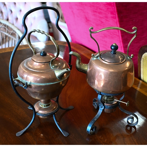 531 - A Henry Loveridge and Co. Arts & Crafts copper kettle with burner, on wrought iron stand, to/w a... 