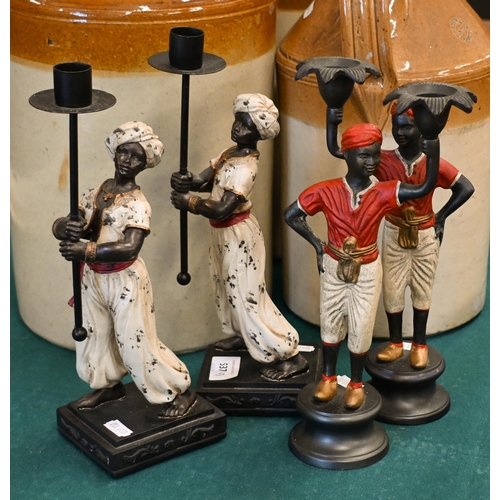 537 - Four cold-painted figural candlesticks, 28/26 cm high