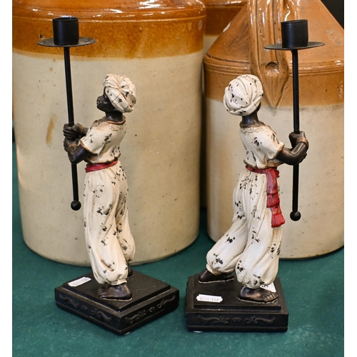 537 - Four cold-painted figural candlesticks, 28/26 cm high