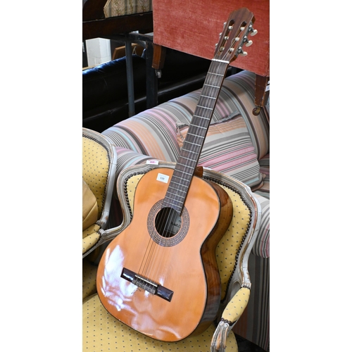 539 - A classical guitar, labelled 'Vittoro K60' for Rudall, Carter & Co, London, with vinyl case