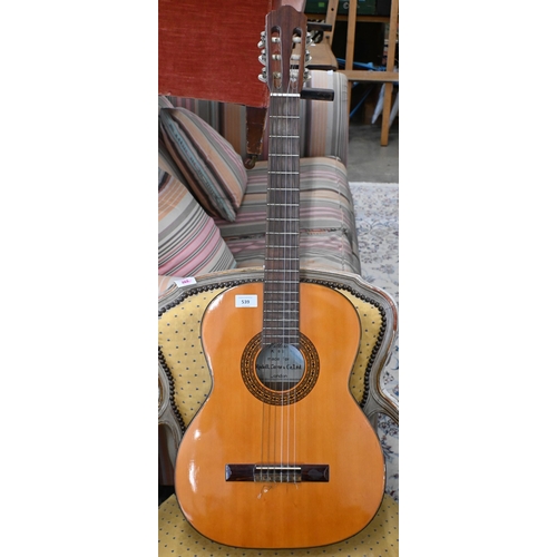 539 - A classical guitar, labelled 'Vittoro K60' for Rudall, Carter & Co, London, with vinyl case