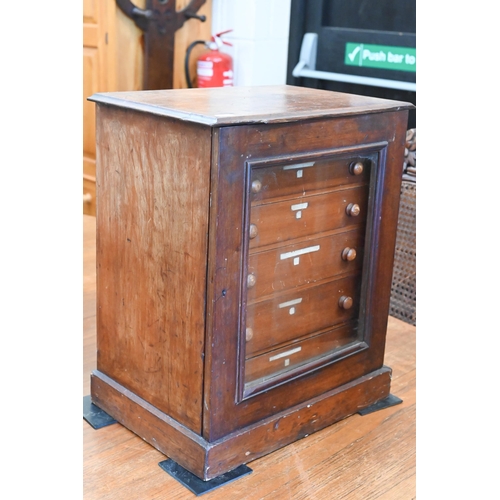 543 - A Victorian stained wood collector's chest of six shallow drawers enclosed by a glazed door, 45 x 38... 