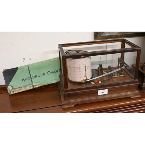 549 - A vintage barograph in glazed oak case, 32 cm wide, to/w two boxes of spare charts and a bottle of i... 