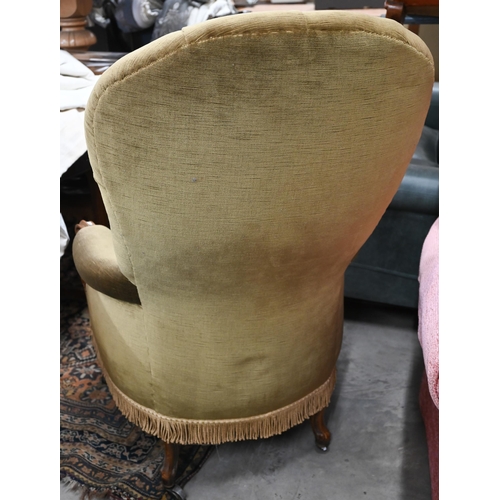 56 - A Victorian oak framed button back armchair, with green upholstery