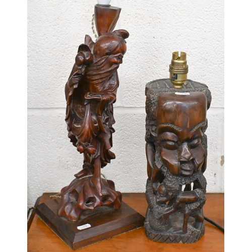 561 - A Chinese carved wood figural lamp to/w an African carved head lamp and a vintage metal anglepoise l... 