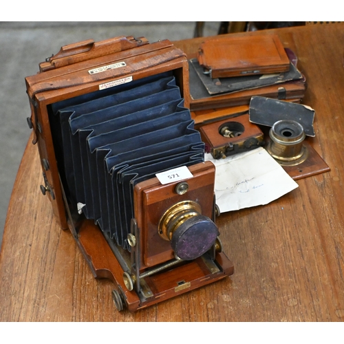 571 - An antique mahogany J Lancaster & Son half-plate camera with Beck Symmetrical lens and Lancaster... 