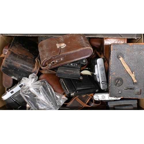 577 - A large quantity of antique, vintage and later cameras, dark-room equipment, leather cases and other... 