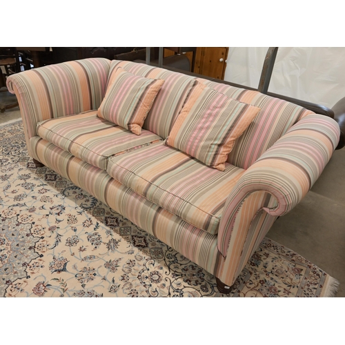 63 - A scroll arm Chesterfield Derwent 'Keat' sofa with 'Kenzo' multi-coloured striped fabric upholstery,... 