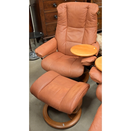 68 - Ekornes Stressless Mayfair reclining armchair in tan leather with swing side table and footstool, 80... 