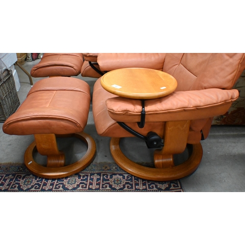 69 - Ekornes Stressless Mayfair reclining armchair in tan leather with swing side table and footstool, 80... 