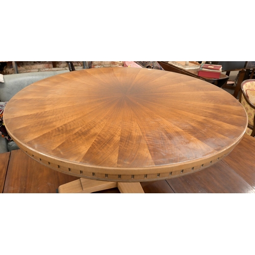 70 - 'Willisau' (Switzerland) circular coffee table with segmented veneered top and quadraform base, 100 ... 