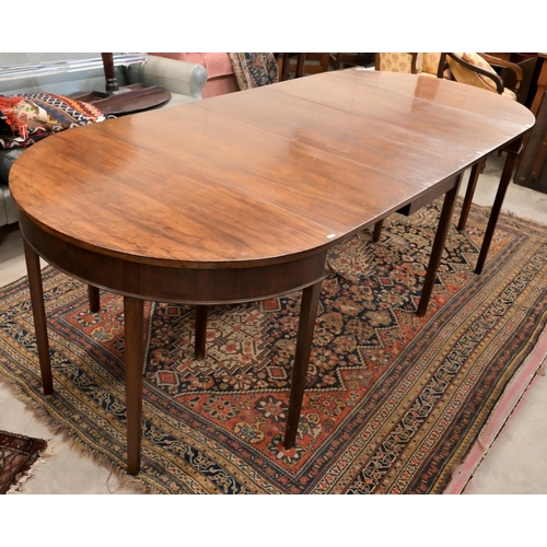 72 - A 19th century mahogany extending dining table with drop-leaf centre between two 'D' ends, raised on... 