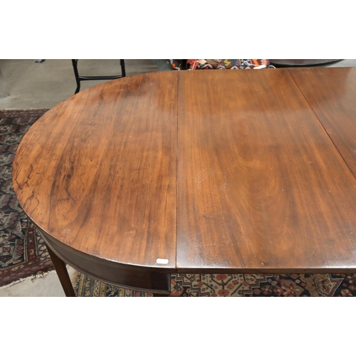 72 - A 19th century mahogany extending dining table with drop-leaf centre between two 'D' ends, raised on... 