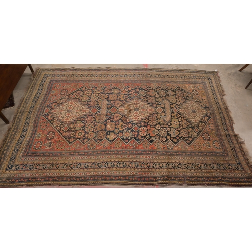 73 - An antique Persian Qashai kelleigh rug, stylised design on navy ground with repeating borders, 266 x... 