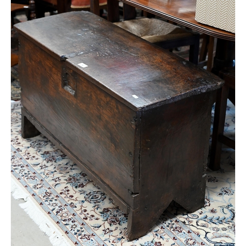 74 - An antique oak plank coffer, simple form of traditional vernacular construction with hinged top and ... 