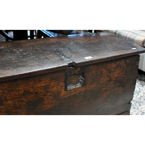 74 - An antique oak plank coffer, simple form of traditional vernacular construction with hinged top and ... 