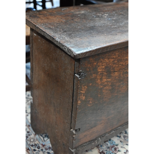 74 - An antique oak plank coffer, simple form of traditional vernacular construction with hinged top and ... 