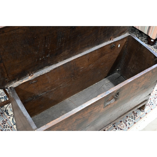 74 - An antique oak plank coffer, simple form of traditional vernacular construction with hinged top and ... 