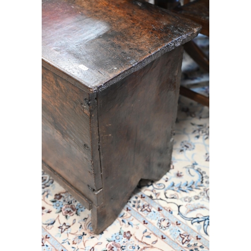 74 - An antique oak plank coffer, simple form of traditional vernacular construction with hinged top and ... 