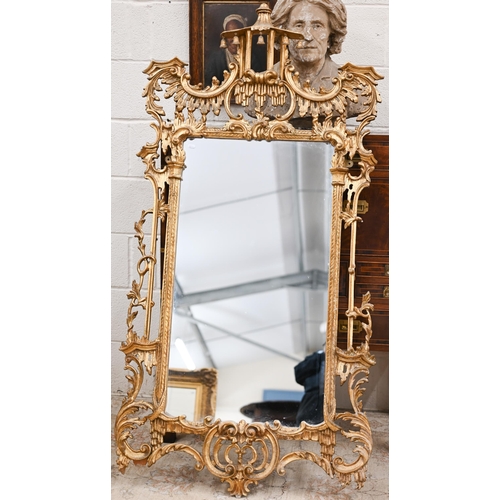 75 - A large Italian reproduction gilt framed mirror in the Chippendale style, 80 cm wide x 160 cm high