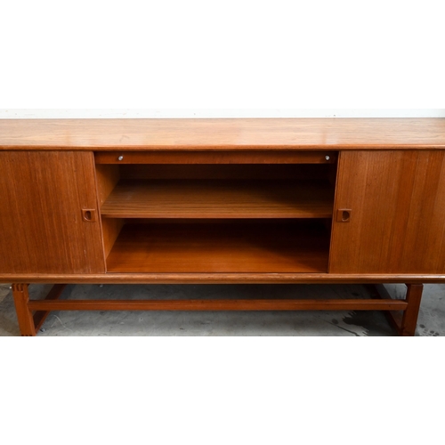 84 - Axel Christensen for Mobler - A Danish Mid-Century teak sideboard with sliding tambour doors and fin... 