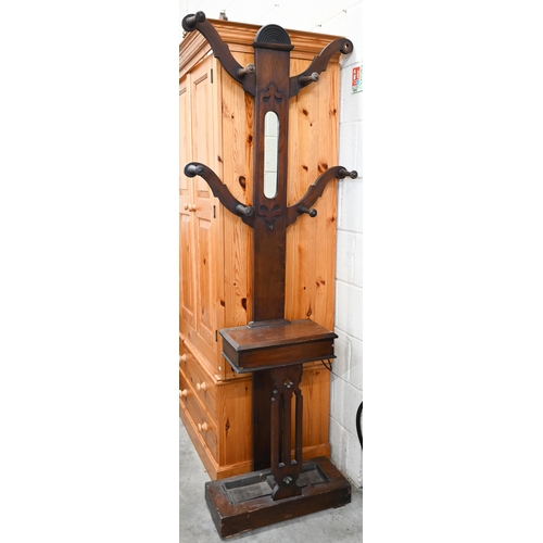 91 - A Victorian mahogany 'tree' hall stand with turned pegs (one missing) and integrated glove box over ... 