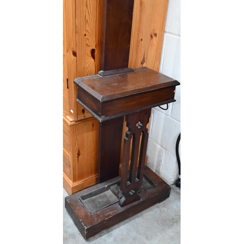 91 - A Victorian mahogany 'tree' hall stand with turned pegs (one missing) and integrated glove box over ... 